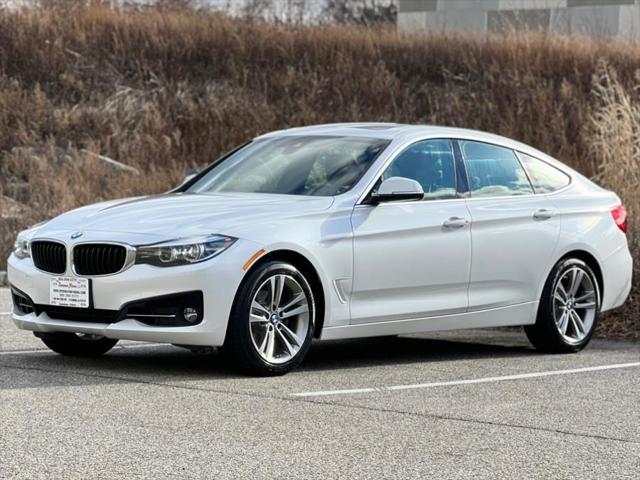 used 2018 BMW 330 car, priced at $18,287