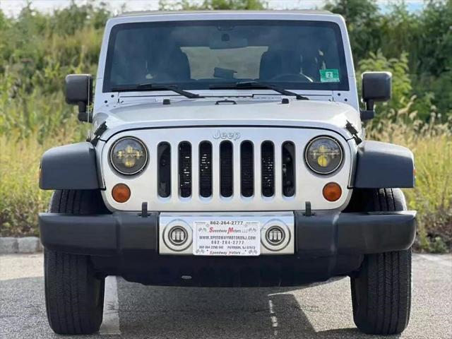 used 2012 Jeep Wrangler Unlimited car, priced at $10,947