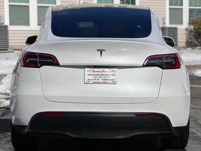 used 2023 Tesla Model Y car, priced at $28,487