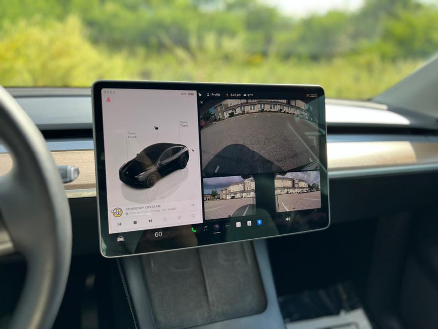 used 2022 Tesla Model Y car, priced at $29,787