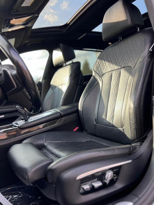 used 2016 BMW 750 car, priced at $16,487