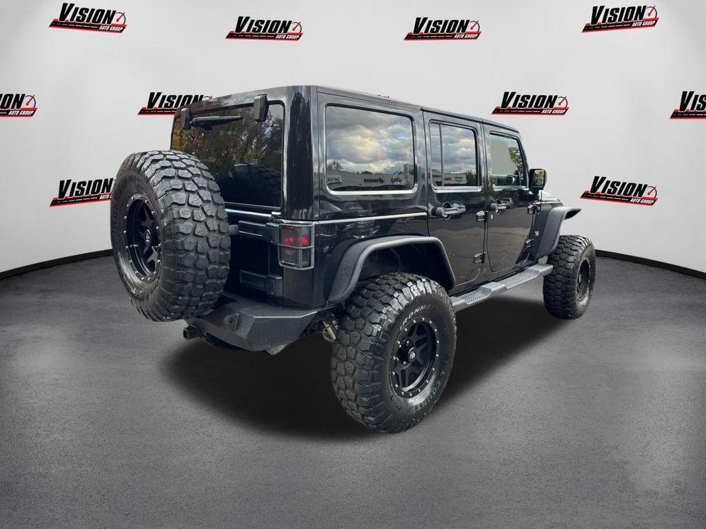 used 2011 Jeep Wrangler Unlimited car, priced at $15,000