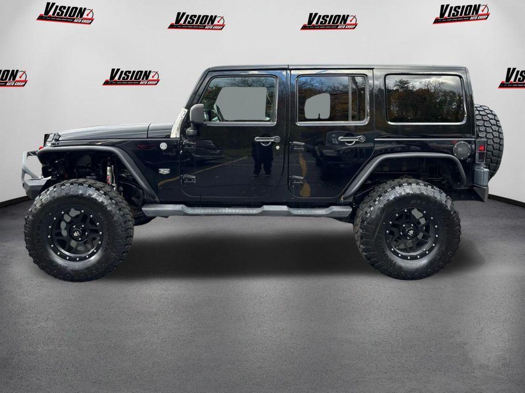 used 2011 Jeep Wrangler Unlimited car, priced at $15,000