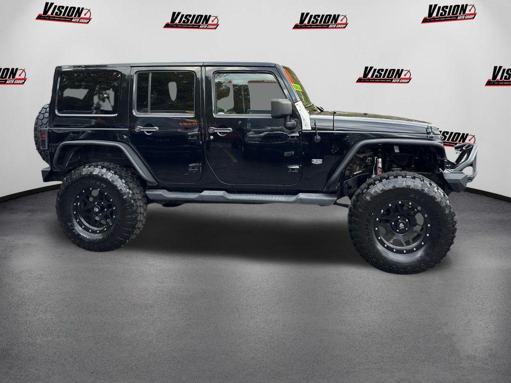 used 2011 Jeep Wrangler Unlimited car, priced at $15,000