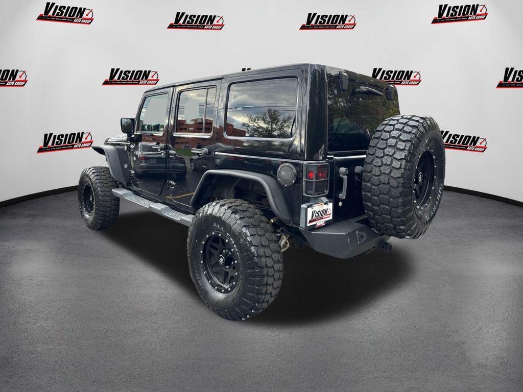 used 2011 Jeep Wrangler Unlimited car, priced at $15,000
