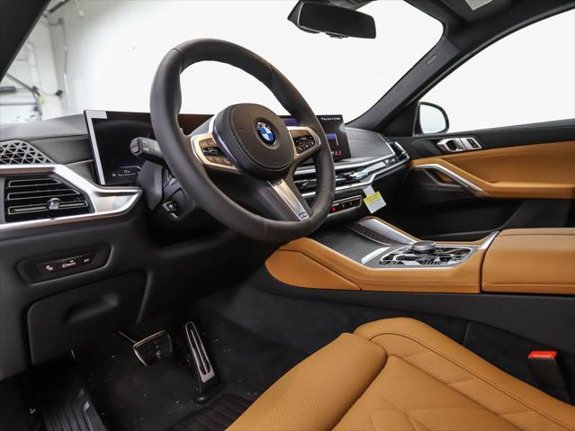 new 2025 BMW X6 car, priced at $77,875