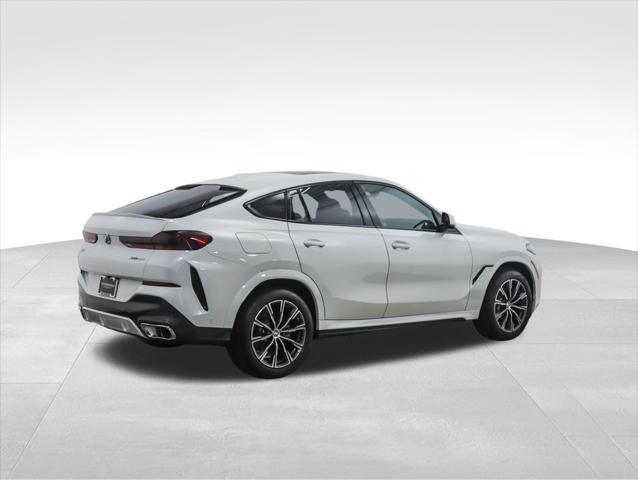 new 2025 BMW X6 car, priced at $77,875