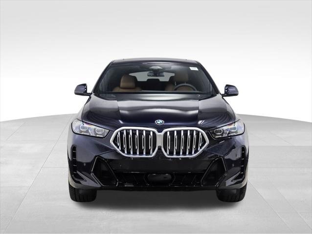 new 2025 BMW X6 car, priced at $77,875