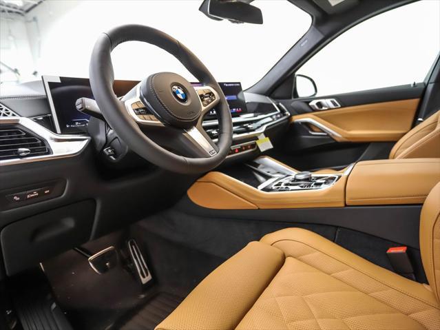 new 2025 BMW X6 car, priced at $77,875