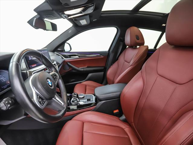 used 2023 BMW X4 car, priced at $54,900