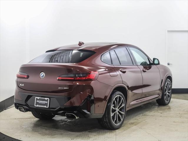 used 2022 BMW X4 car, priced at $37,570