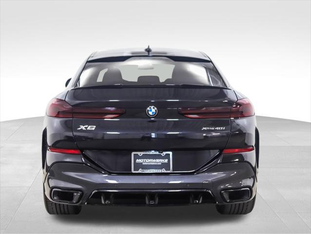 used 2022 BMW X6 car, priced at $60,900