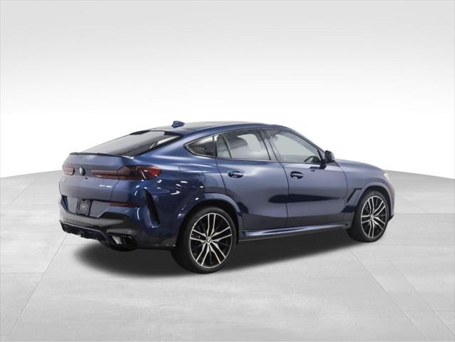 used 2023 BMW X6 car, priced at $67,900