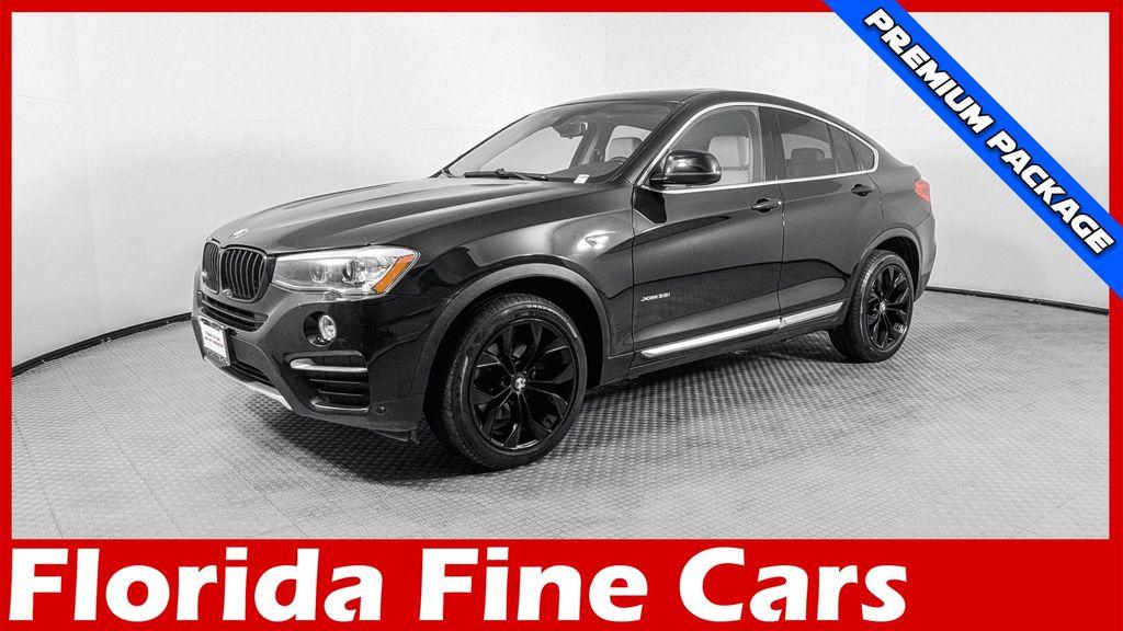 used 2016 BMW X4 car, priced at $10,499