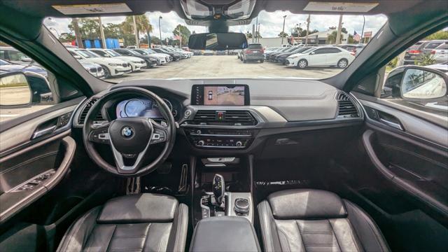 used 2019 BMW X4 car, priced at $32,699