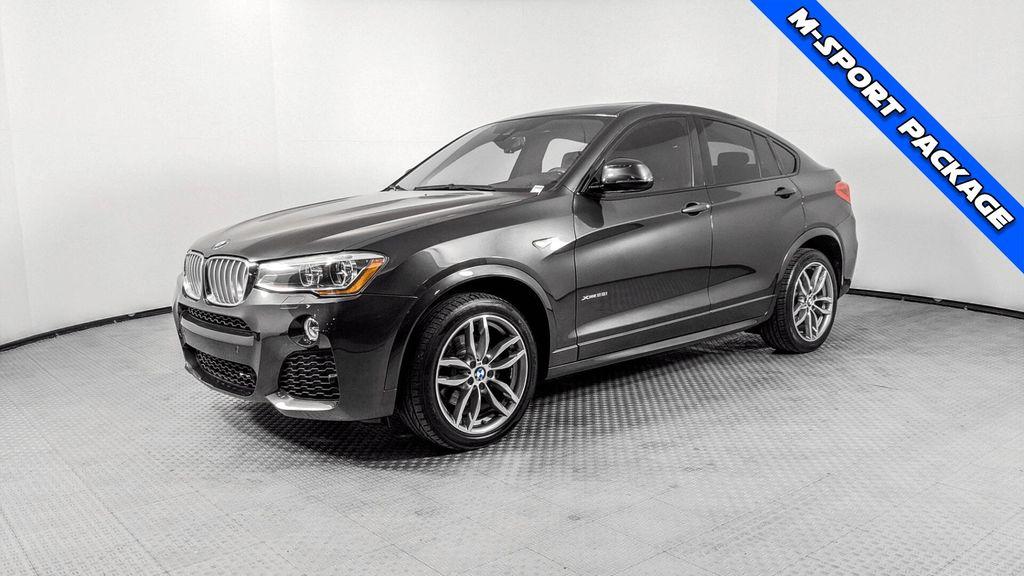 used 2018 BMW X4 car, priced at $18,499