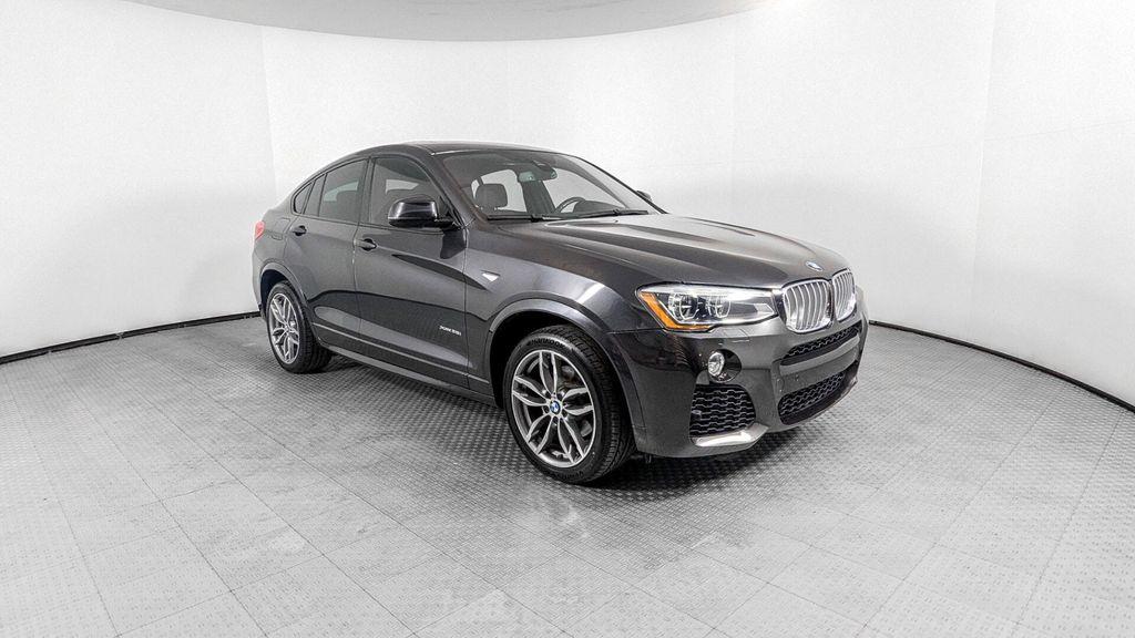 used 2018 BMW X4 car, priced at $18,499