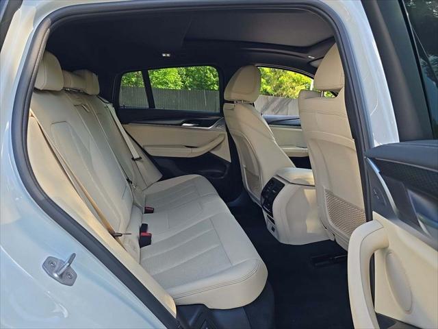 used 2022 BMW X4 car, priced at $39,499