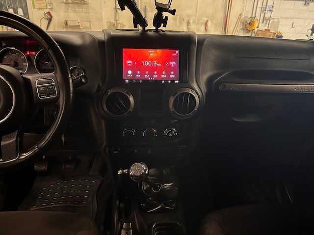 used 2015 Jeep Wrangler car, priced at $15,945