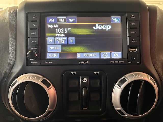 used 2014 Jeep Wrangler Unlimited car, priced at $16,995