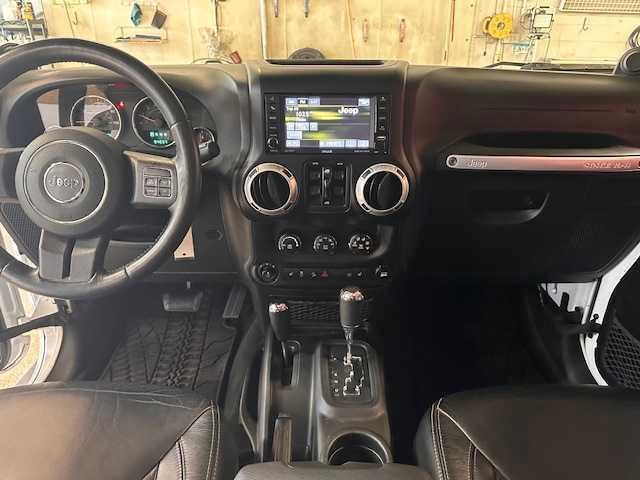 used 2014 Jeep Wrangler Unlimited car, priced at $16,995