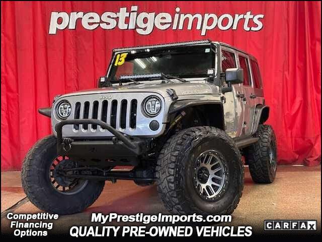 used 2013 Jeep Wrangler Unlimited car, priced at $15,995