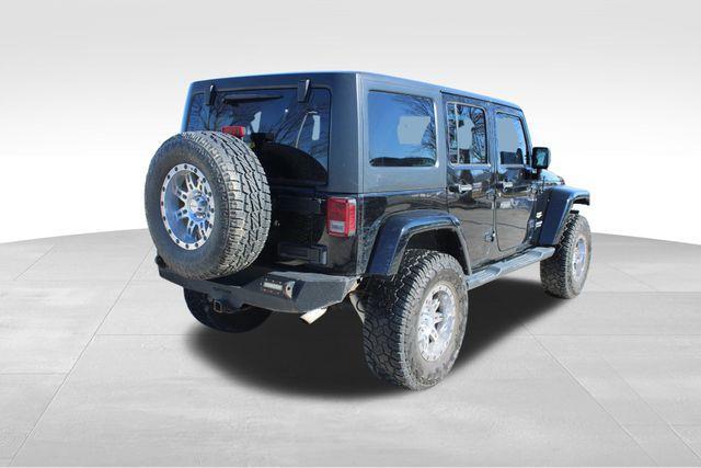 used 2014 Jeep Wrangler Unlimited car, priced at $18,277