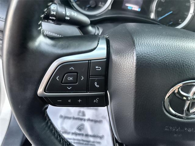 used 2021 Toyota Highlander Hybrid car, priced at $29,600