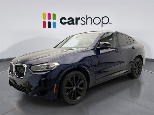 used 2023 BMW X4 car, priced at $50,000