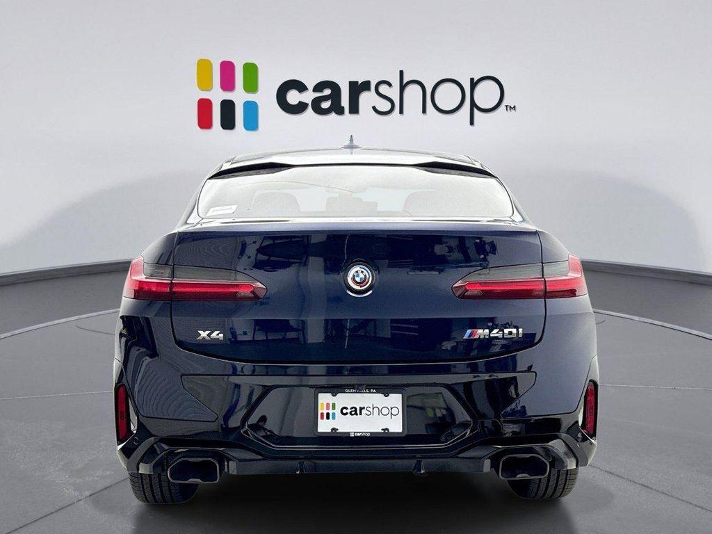 used 2023 BMW X4 car, priced at $52,899