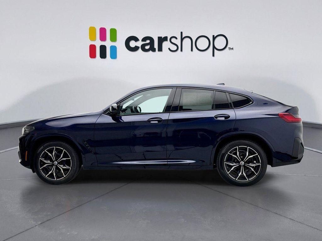 used 2023 BMW X4 car, priced at $52,899