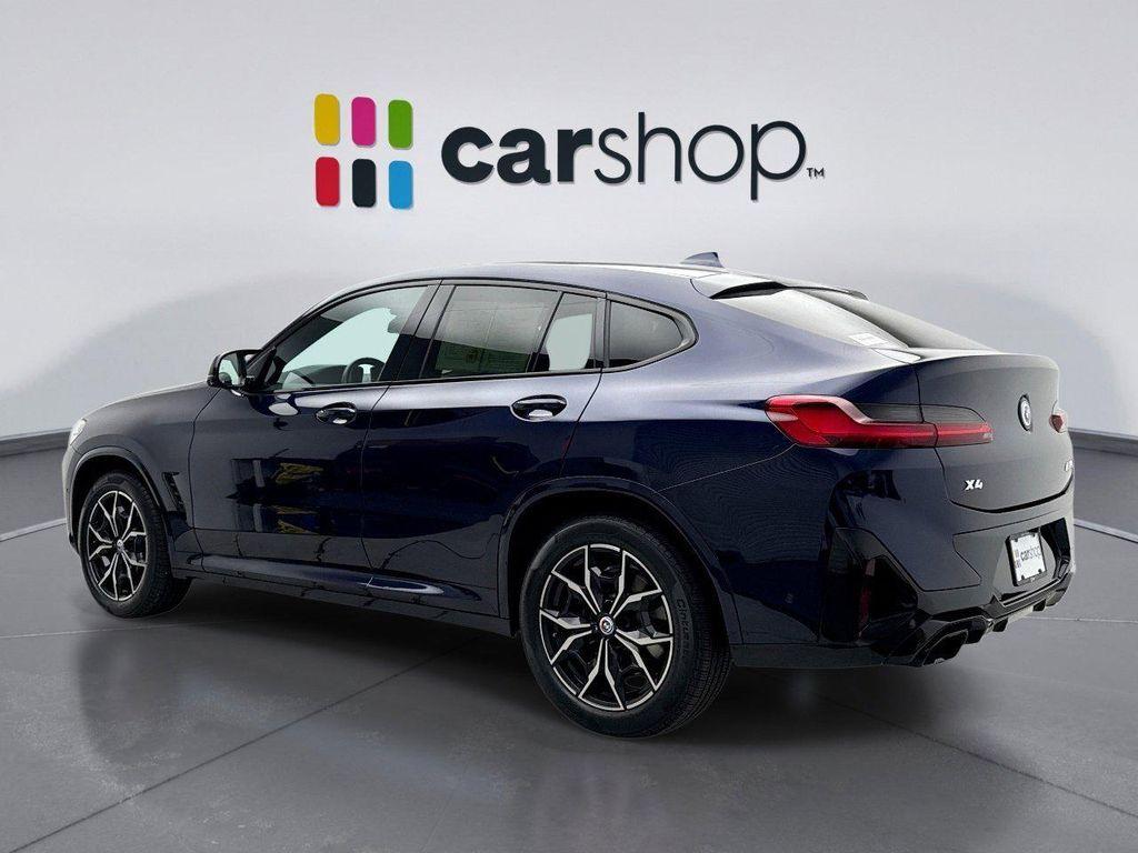 used 2023 BMW X4 car, priced at $52,899
