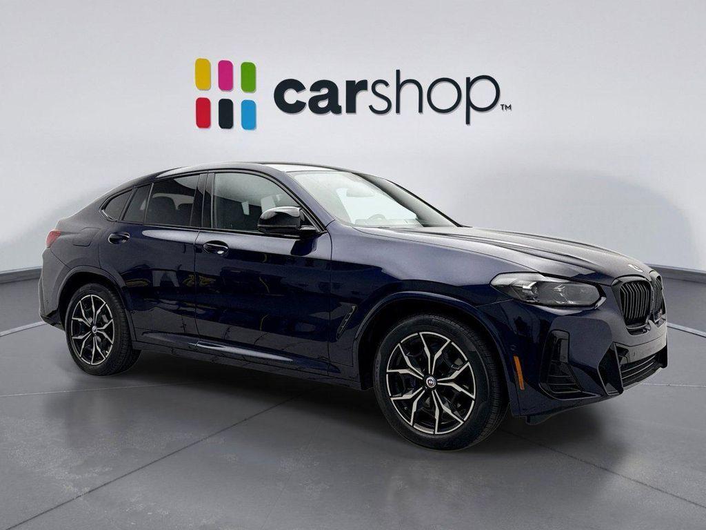 used 2023 BMW X4 car, priced at $52,899