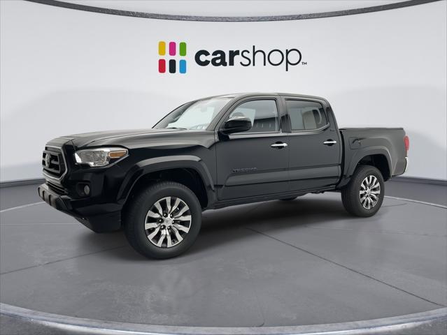 used 2023 Toyota Tacoma car, priced at $29,996