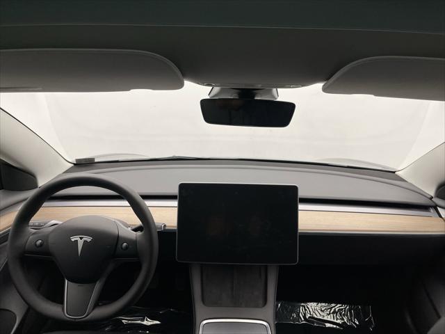 used 2023 Tesla Model 3 car, priced at $25,899