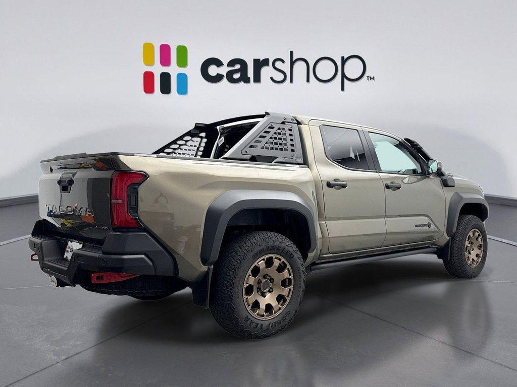 used 2024 Toyota Tacoma Hybrid car, priced at $56,299