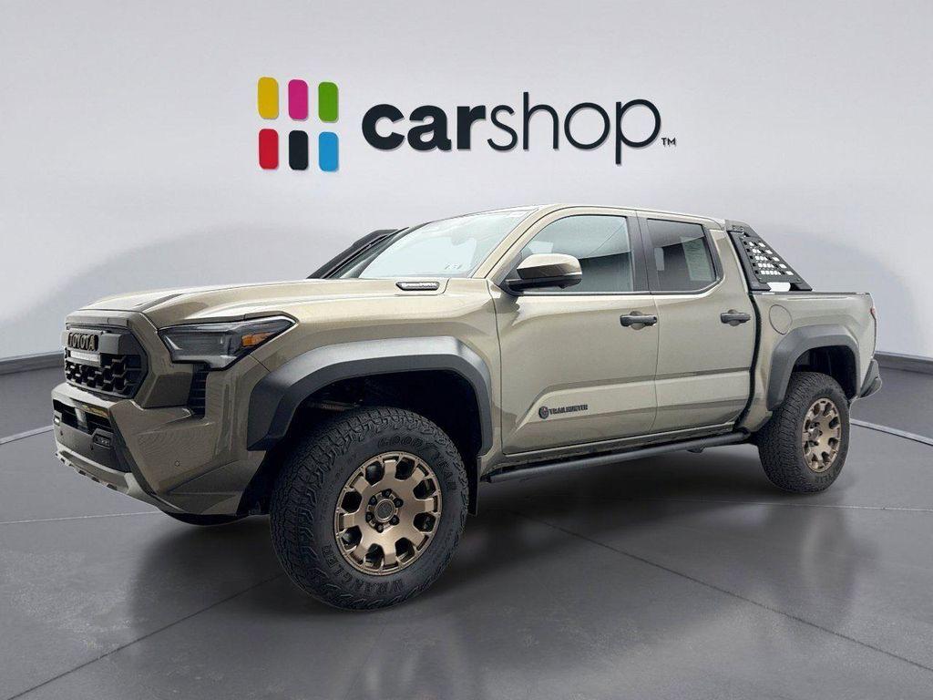 used 2024 Toyota Tacoma Hybrid car, priced at $56,299