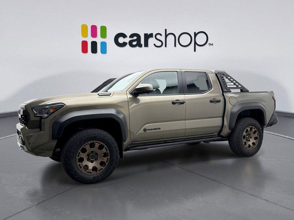 used 2024 Toyota Tacoma Hybrid car, priced at $56,999