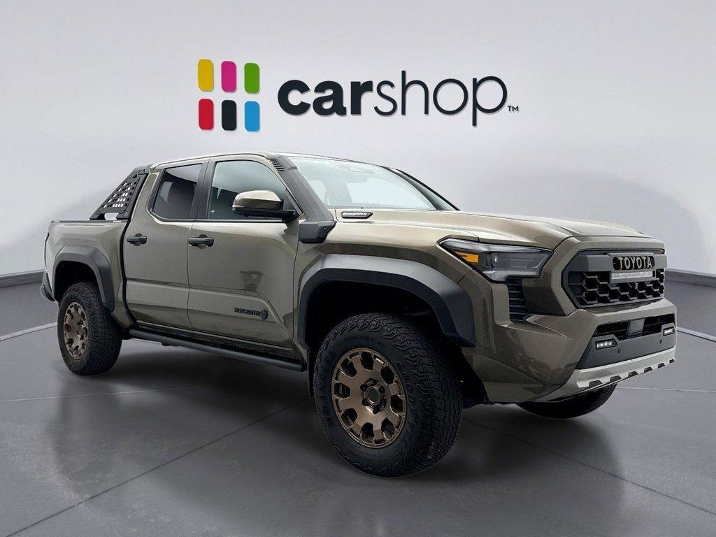 used 2024 Toyota Tacoma Hybrid car, priced at $56,299