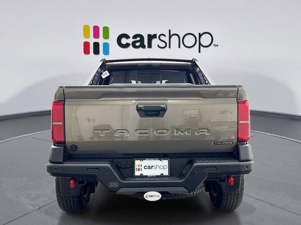 used 2024 Toyota Tacoma Hybrid car, priced at $56,299