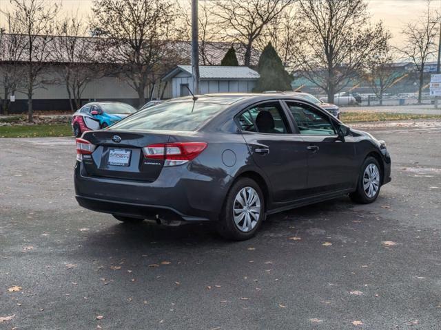 used 2023 Subaru Impreza car, priced at $17,000