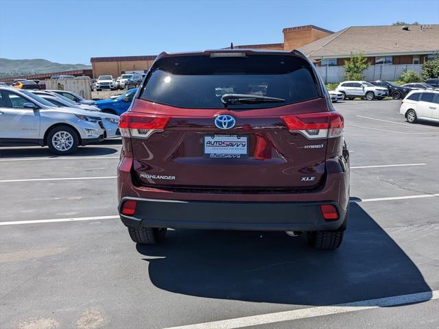 used 2019 Toyota Highlander Hybrid car, priced at $30,000