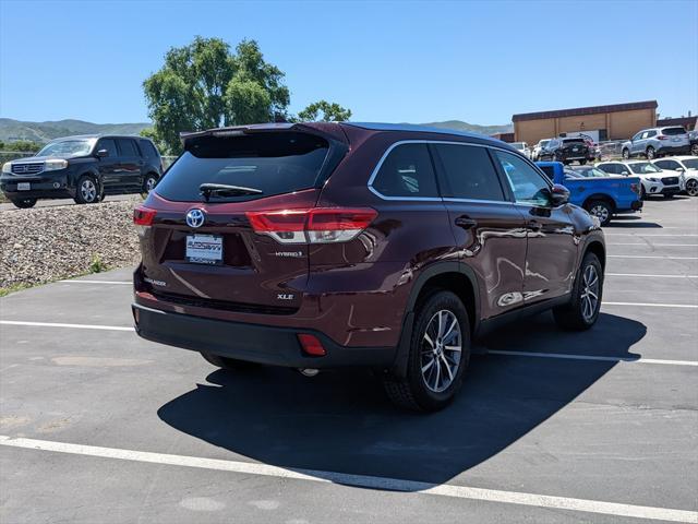 used 2019 Toyota Highlander Hybrid car, priced at $30,000