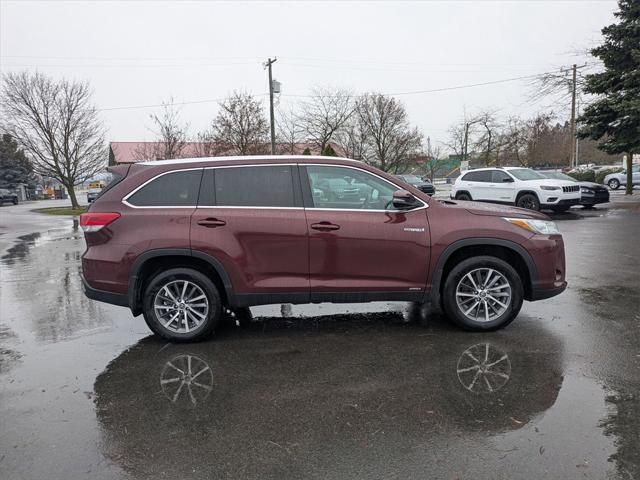 used 2019 Toyota Highlander Hybrid car, priced at $29,200