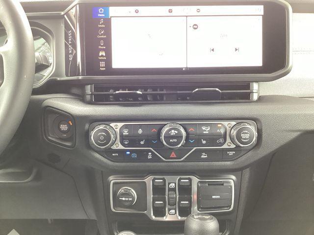 new 2025 Jeep Wrangler 4xe car, priced at $50,074