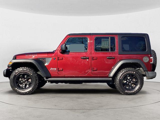 used 2021 Jeep Wrangler Unlimited car, priced at $34,592