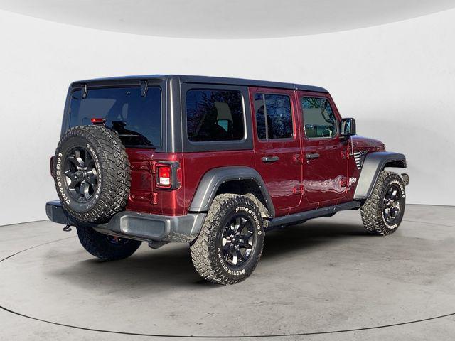 used 2021 Jeep Wrangler Unlimited car, priced at $34,592