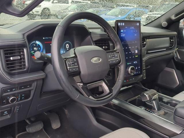 used 2023 Ford F-150 Lightning car, priced at $64,900