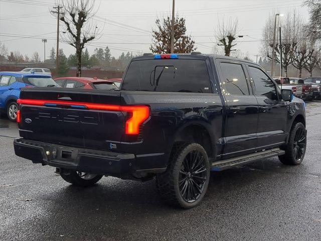 used 2023 Ford F-150 Lightning car, priced at $64,900