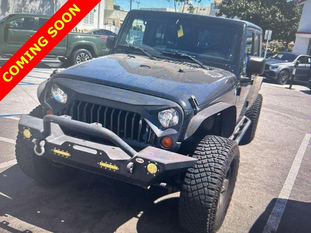 used 2011 Jeep Wrangler Unlimited car, priced at $13,800